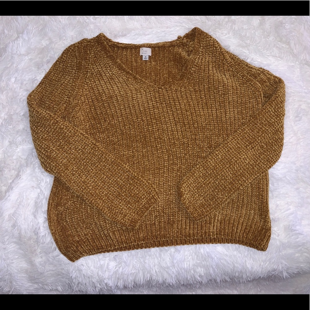 yellow sweater